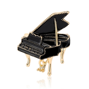 Elegant black and gold grand piano brooch pin with enamel finish and metallic accents
