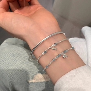 Ethnic silver bangle and pearl fish charm bracelet set with blue aquamarine beads