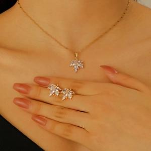 Conjunto de joyas de lujo con hoja de arce, collar de cobre con circonita y pendientes