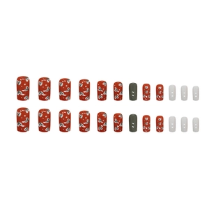 Vintage red and green floral press-on nails set with heart patterns on white background