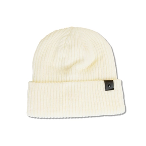 Detail of off-white ribbed knit beanie featuring a black leather label with Favorite text
