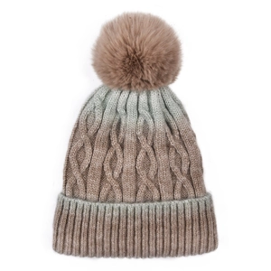 Detailed cable knit texture and large faux fur pom-pom on the gradient winter beanie