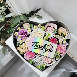 Holographic laser Thank You card placed in heart shaped gift box with mixed color flowers
