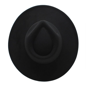 Top view of a black wool fedora featuring a teardrop dented crown and wide flat brim