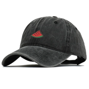 Close-up of embroidered watermelon on washed cotton baseball cap with retro finish