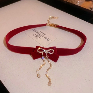 Vintage red velvet choker with rhinestone bow and dangling tassel pendant chains