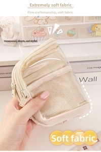 Detail showing soft fabric texture and transparent mesh layers of the stationery bag