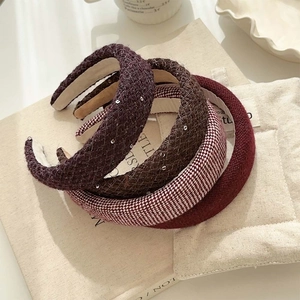 Three-piece set of thick knit French style headbands in burgundy, purple and plaid