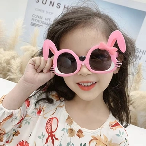 Cute pink bunny ears sunglasses for kids with decorative bow and dark round lenses