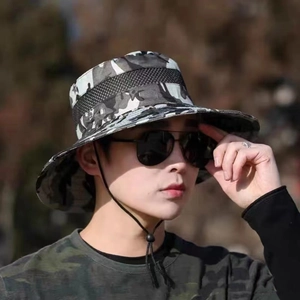 Outdoor camouflage bucket hat in black and white with breathable mesh and chin strap