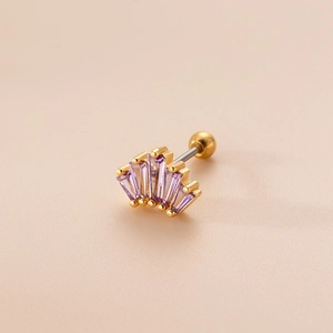 Detailed view of crown-shaped gold cartilage stud with five purple rectangular zircons
