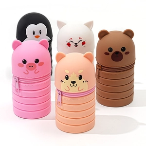 Collapsible silicone animal pencil cases in penguin, cat, pig, and bear designs