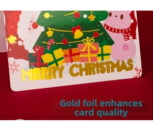 Détail d'une carte de Noël avec texte doré Merry Christmas et illustration d'ours