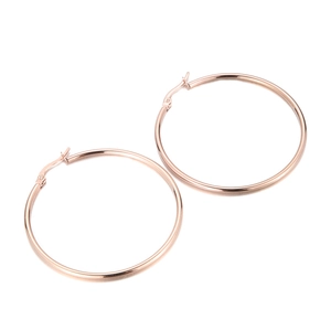 Minimalist rose gold stainless steel hoop earrings with high-polish metallic finish