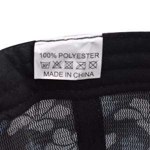 Detail of internal label showing 100% polyester material and washing care symbols
