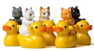Detailed collection of five colorful cats riding yellow ducks for garden decor