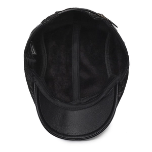 Béret vintage en cuir PU noir montrant la doublure en coton et la bande de transpiration