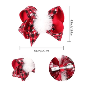 Detailed view of red plaid Christmas bow clip with snowflake pattern and size dimensions