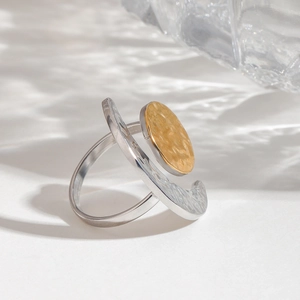 Minimalist adjustable mixed-metal ring with hammered texture sun and moon motifs