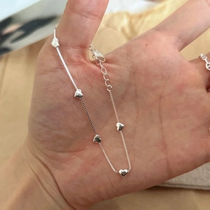 Elegant S925 sterling silver box chain bracelet with multiple polished heart charms for women