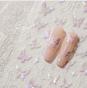 Macro shot of 3D laser purple butterfly nail stickers with pearlescent shell finish