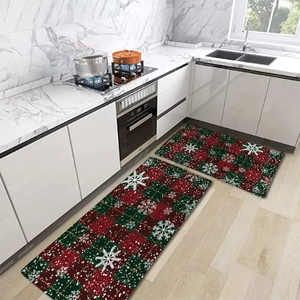 Christmas kitchen mat set with red and green plaid snowflakes in a modern kitchen