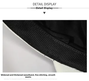 Detail view of widened and thickened black sweatband with fine stitching on white cap