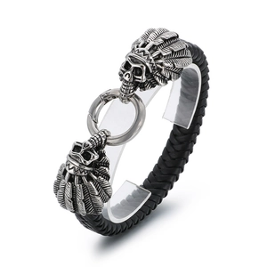 Men's vintage black braided leather bracelet with silver skull and feather metal charms