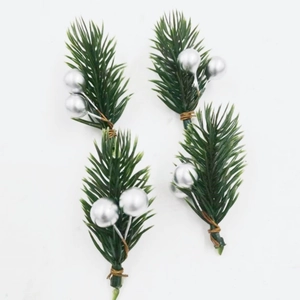 Detailed view of 4-piece set dark green pine needles with shiny silver berry branches