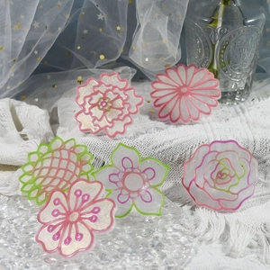 Detalle de moldes de silicona de 6 flores para joyas de resina DIY con purpurina