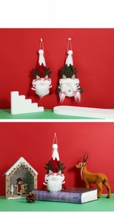 Détails de gnomes de Noël avec bois de renne et nœuds à carreaux rouges et blancs suspendus