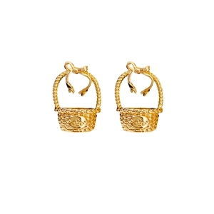 Exquisite golden flower basket earrings with bow accent and woven texture on white background