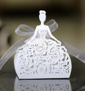 Detailed laser-cut bride silhouette wedding favor box with white organza ribbon