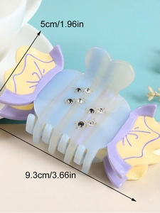 Candy-shaped acetate hair claw clip with rhinestones, sized 9.3cm x 5cm for hair styling