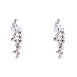 Elegant silver tassel earrings with irregular zircon crystals on a clean white background
