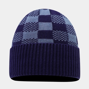 Winter checkerboard knit hat in purple and light blue with thick ribbed fold-over cuff