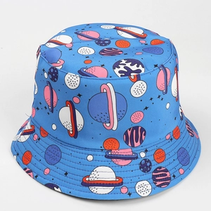 Detailed view of sky blue space theme bucket hat with colorful planets and star patterns
