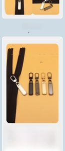 Detailed view of detachable metal zipper puller set in five versatile metallic finishes