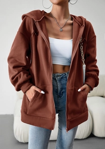 Detail of warm brown fleece hoodie for women featuring a zip-up front and side pockets