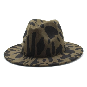Detailed texture of cow print fedora hat in brown wool felt with a classic pinched crown