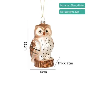 Detailed view of glass owl Christmas ornament with glitter and dimensions 11x6x7cm