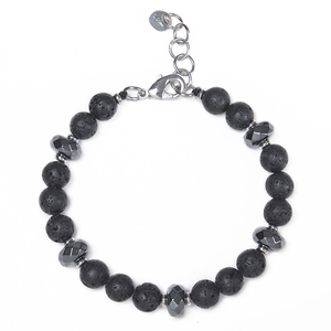 Close-up of stainless steel lobster clasp and volcanic stone beads on a bracelet