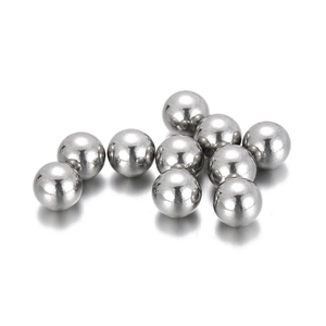 Close-up of polished stainless steel loose beads for DIY jewelry making and necklace crafts