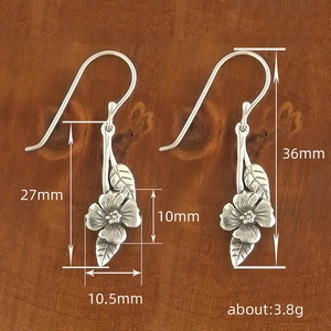 Vintage floral drop earrings in bicolor metal finish with retro leaf design for women