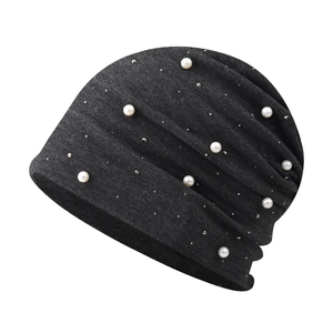 Dark grey knitted beanie for women featuring elegant pearls and silver stud decorations