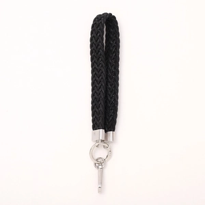 Minimalist black woven wrist strap with premium silver metal ring and swivel clasp hook