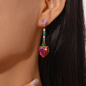 Detail view of heart-shaped crystal tassel earrings with colorful zirconia stones