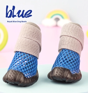 Detailed view of royal blue breathable mesh dog shoe with elastic knitted ankle and rubber sole