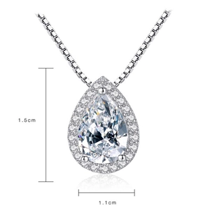 Detailed view of pear-cut moissanite pendant with dimensions 1.5 cm by 1.1 cm