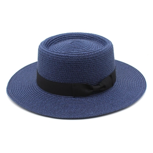 Classic dark blue flat-top boater hat with wide brim and black bow ribbon for summer